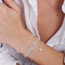 Bracelet élastique en argent - Perles lisses facettées & Disques TAILLE L